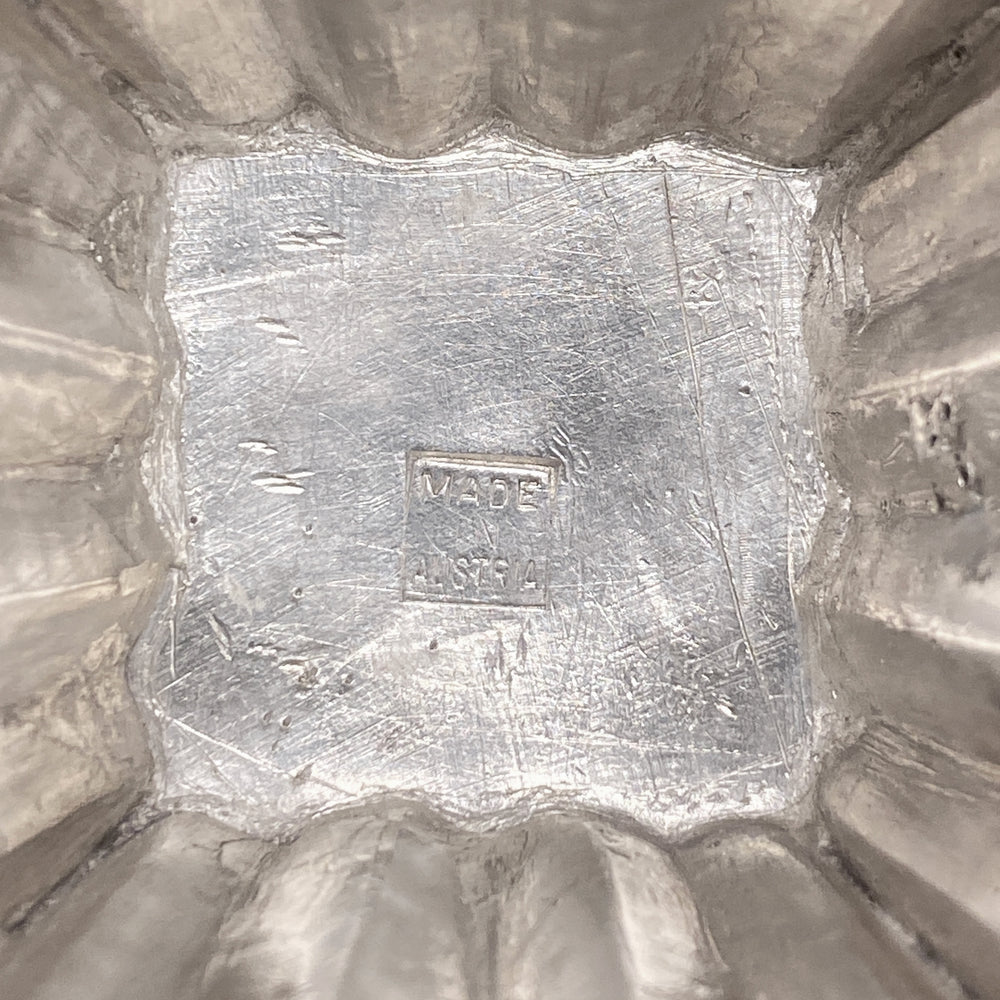 
                      
                        Macklowe Gallery Josef Hoffmann Hammered Silver Centerpiece and Pair of Vases
                      
                    