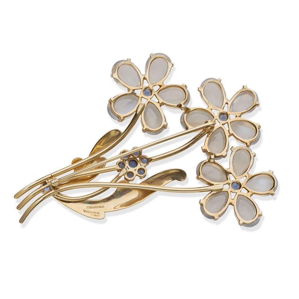 
                      
                        Macklowe Gallery Retro Tiffany & Co. Moonstone and Sapphire Flower Brooch
                      
                    