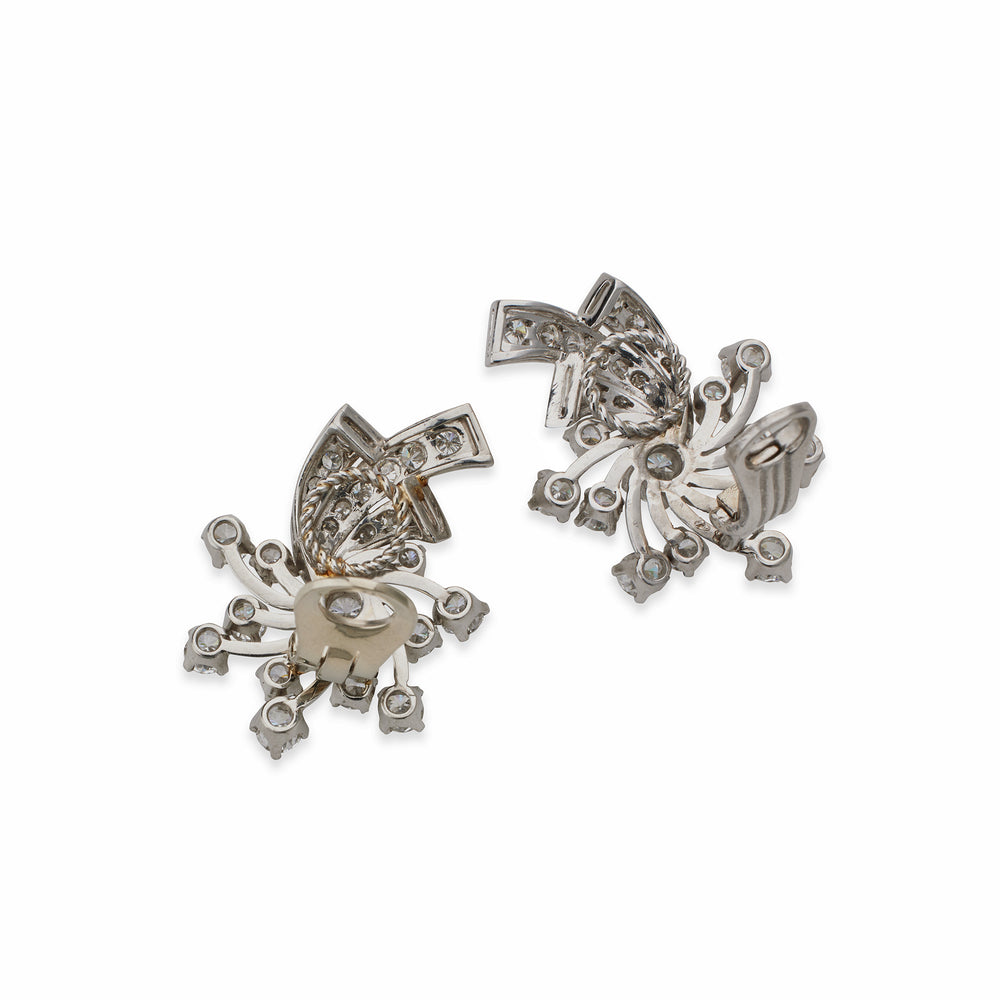 
                      
                        Macklowe Gallery Mid-Century Platinum and Diamond Clip Earrings
                      
                    