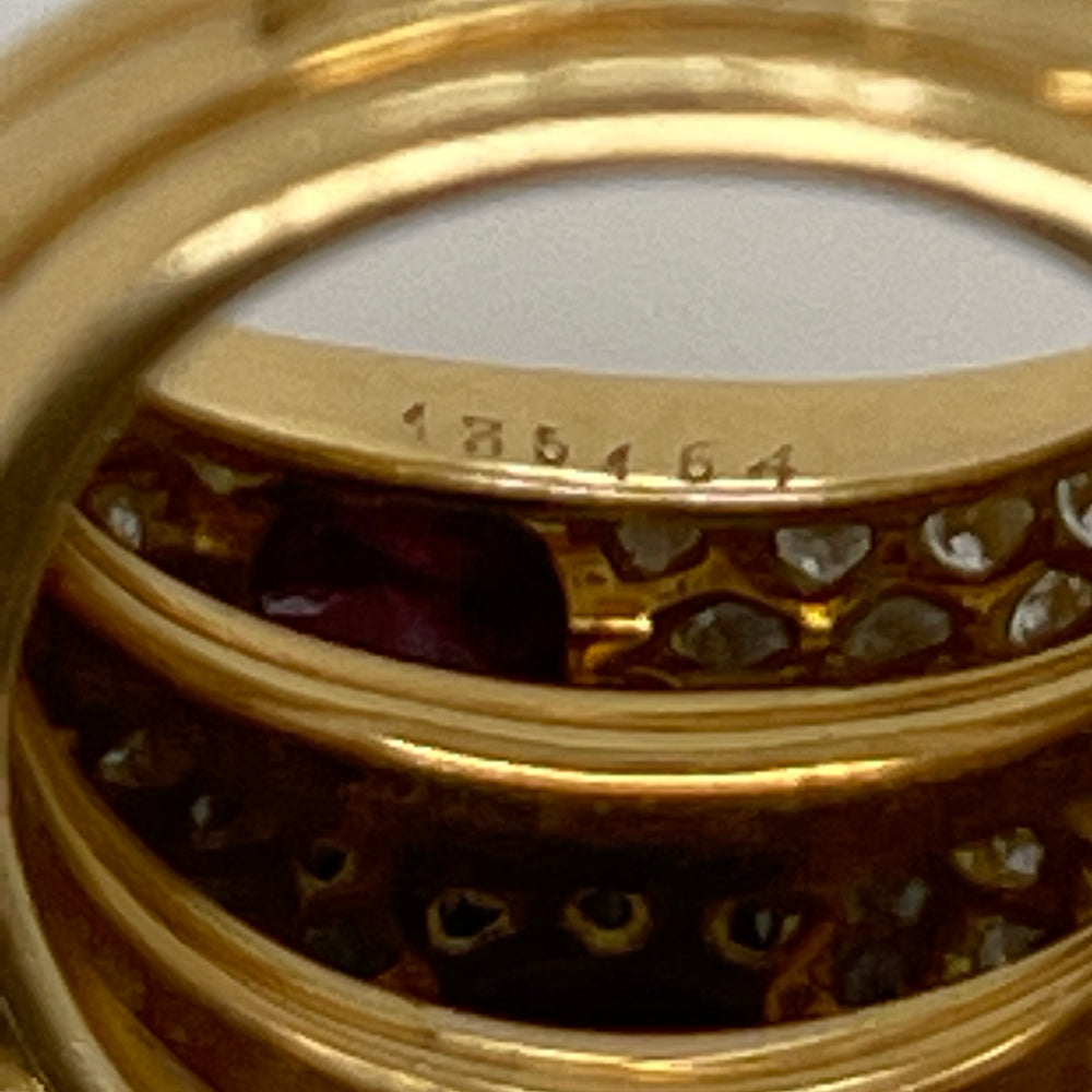 
                      
                        Cartier Ruby and Diamond “Three Band” Ring
                      
                    