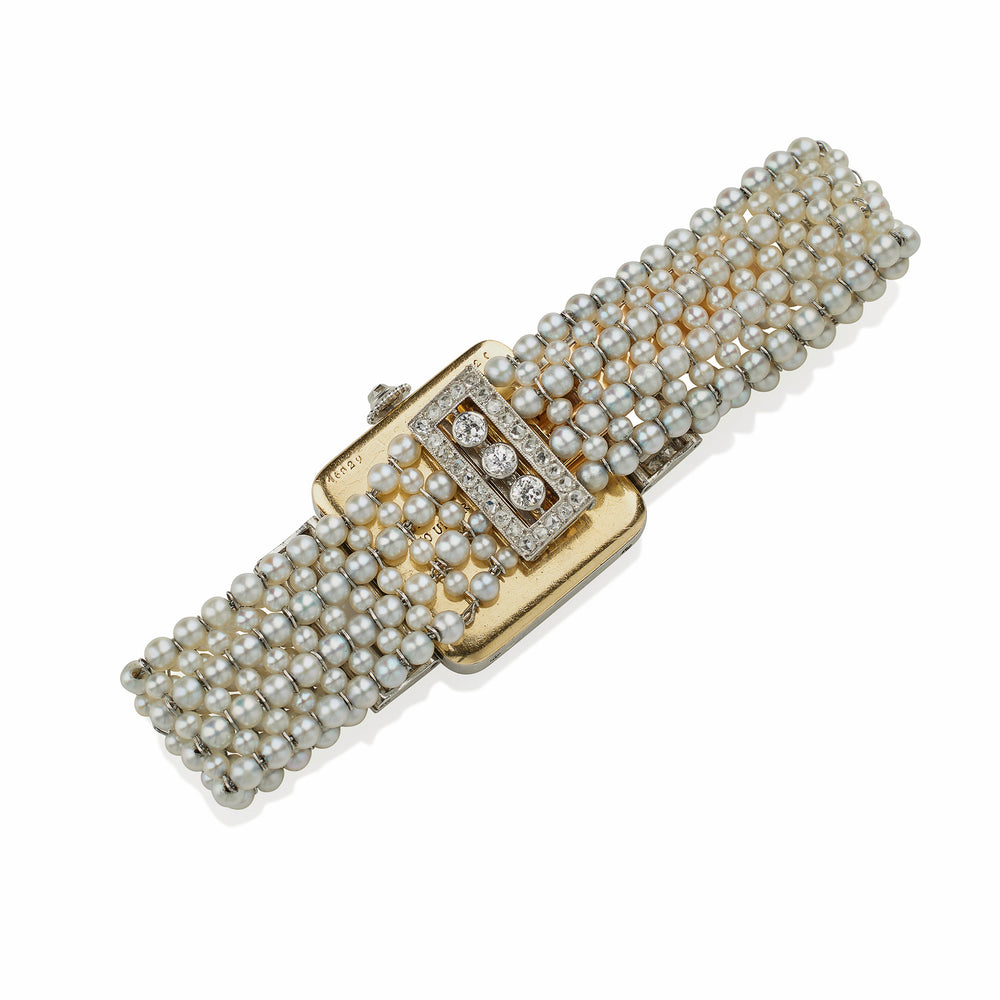 
                      
                        Macklowe Gallery Cartier Paris and Edmond Jaeger Seed Pearl and Diamond Wristwatch
                      
                    